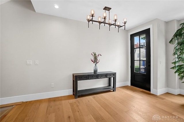 1000 Paradrome St, Cincinnati, OH 45202 - foyer with a chandelier, baseboards, light wood-style floors, and recessed lighting