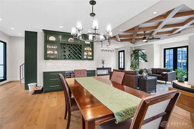 1000 Paradrome St, Cincinnati, OH 45202 - dining room featuring recessed lighting, coffered ceiling, beam ceiling, light wood finished floors, and a chandelier