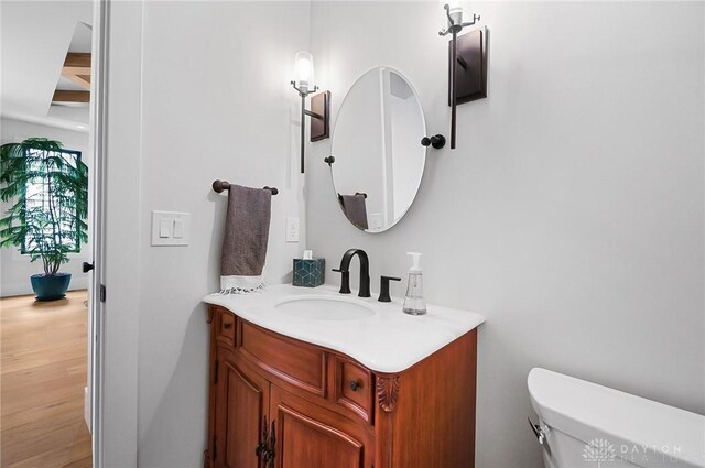 1000 Paradrome St, Cincinnati, OH 45202 - bathroom featuring vanity, toilet, and wood finished floors