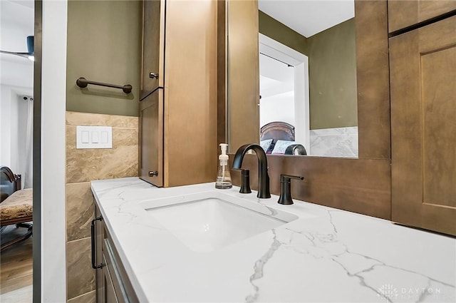 1000 Paradrome St, Cincinnati, OH 45202 - bathroom featuring vanity and tile walls