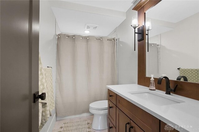 1000 Paradrome St, Cincinnati, OH 45202 - bathroom featuring vanity, toilet, tile patterned floors, and shower / bath combo