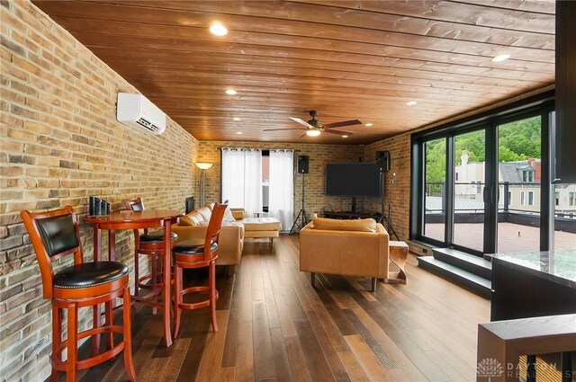 1000 Paradrome St, Cincinnati, OH 45202 - living area with wood ceiling, brick wall, a wall unit AC, ceiling fan, and wood-type flooring