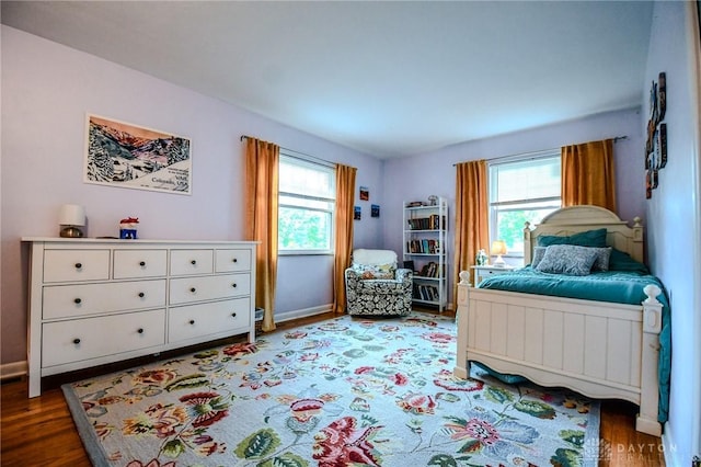 200 Maysfield Rd, Oakwood, OH 45419 - bedroom with multiple windows, wood finished floors, and baseboards