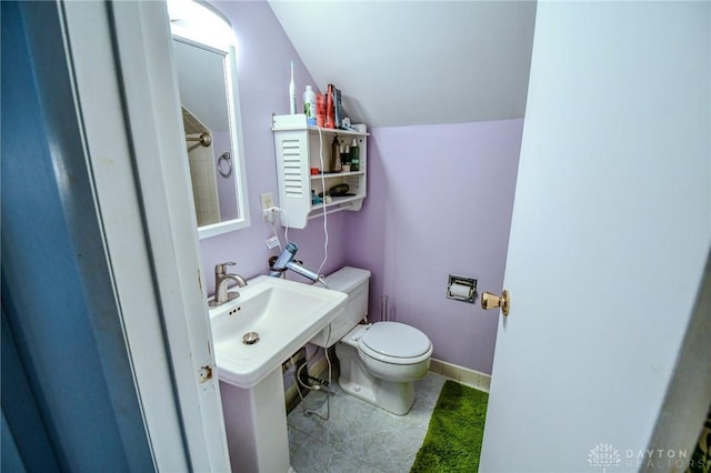 200 Maysfield Rd, Oakwood, OH 45419 - bathroom with toilet, vaulted ceiling, and tile patterned floors