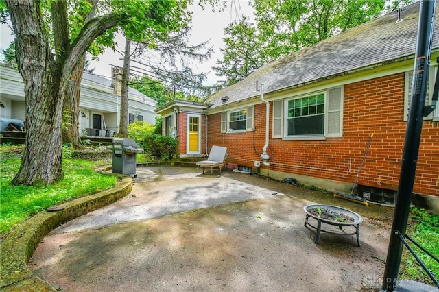200 Maysfield Rd, Oakwood, OH 45419 - view of patio with grilling area and a fire pit