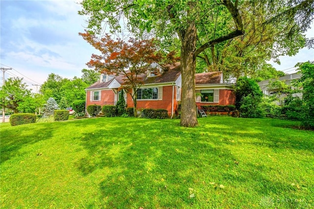 200 Maysfield Rd, Oakwood, OH 45419 - view of front facade with brick siding and a front yard
