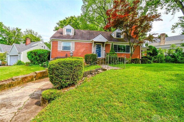 200 Maysfield Rd, Oakwood, OH 45419 - cape cod home featuring brick siding and a front lawn