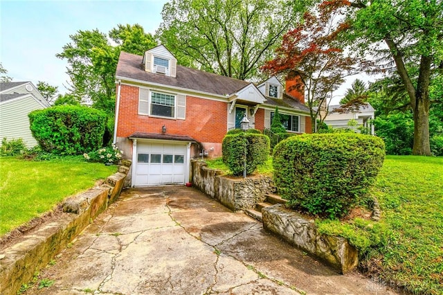 200 Maysfield Rd, Oakwood, OH 45419 - cape cod home featuring driveway, brick siding, a garage, and a front lawn