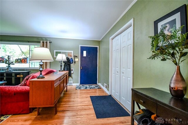 200 Maysfield Rd, Oakwood, OH 45419 - foyer with crown molding, light wood-style floors, and baseboards