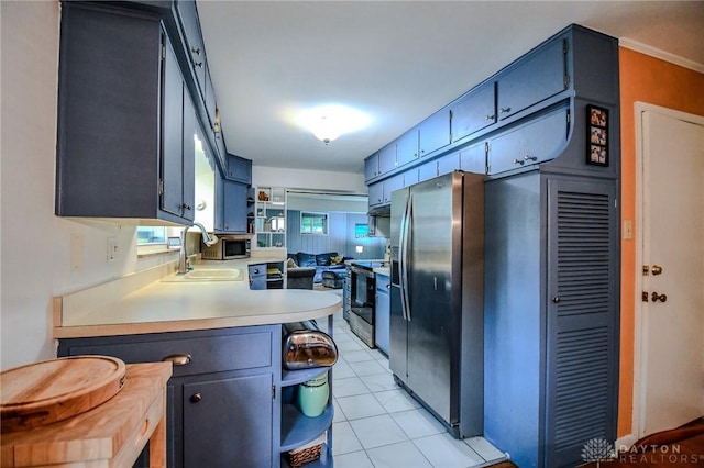 200 Maysfield Rd, Oakwood, OH 45419 - kitchen featuring a sink, stainless steel appliances, a peninsula, light countertops, and open shelves