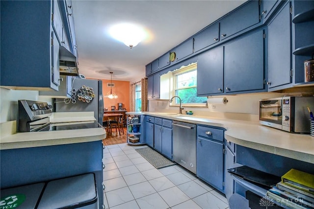 200 Maysfield Rd, Oakwood, OH 45419 - kitchen with appliances with stainless steel finishes, open shelves, a sink, blue cabinets, and light countertops