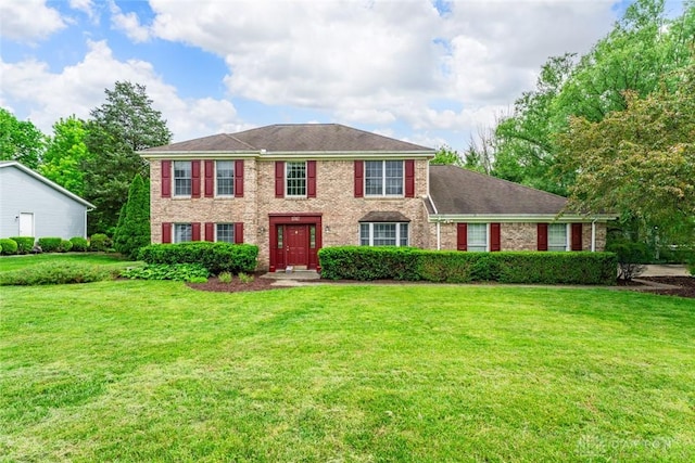 1747 Maple Ln, Beavercreek, OH 45432 - view of front of house featuring a front lawn and brick siding
