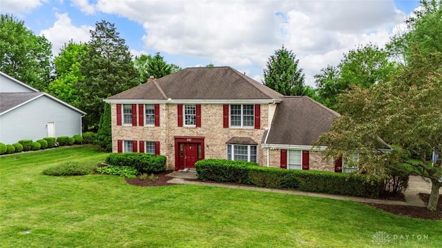 1747 Maple Ln, Beavercreek, OH 45432 - colonial inspired home featuring brick siding and a front yard