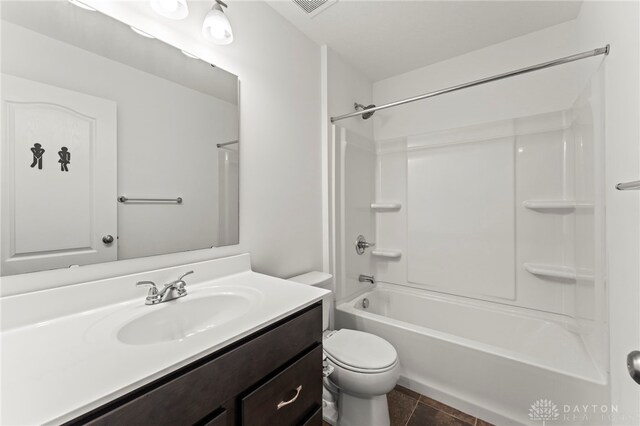 1130 Arden Way, Fairborn, OH 45324 - full bath featuring vanity, toilet, shower / bathtub combination, and tile patterned flooring