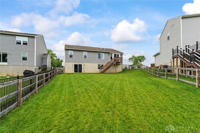 1130 Arden Way, Fairborn, OH 45324 - back of property featuring stairs and a wooden deck