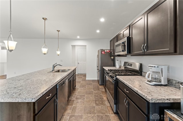 1130 Arden Way, Fairborn, OH 45324 - kitchen featuring appliances with stainless steel finishes, a sink, dark brown cabinetry, light countertops, and recessed lighting