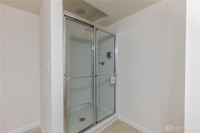 8730 Dowd Ct, Washington Twp, OH 45458 - full bathroom with baseboards and an enclosed shower