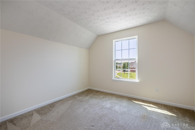 8730 Dowd Ct, Washington Twp, OH 45458 - bonus room with vaulted ceiling, carpet floors, and baseboards
