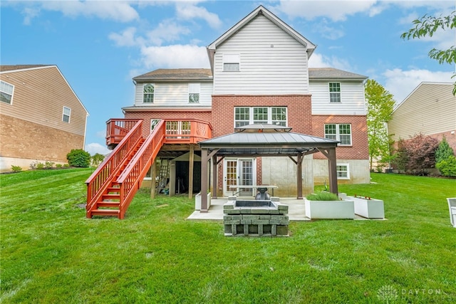 8730 Dowd Ct, Washington Twp, OH 45458 - rear view of house with brick siding, a gazebo, a yard, and stairs