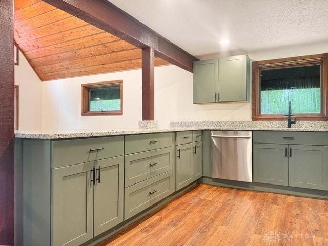 5565 Short Rd, New Carlisle, OH 45344 - kitchen with stainless steel dishwasher, green cabinets, light wood-style flooring, and a sink