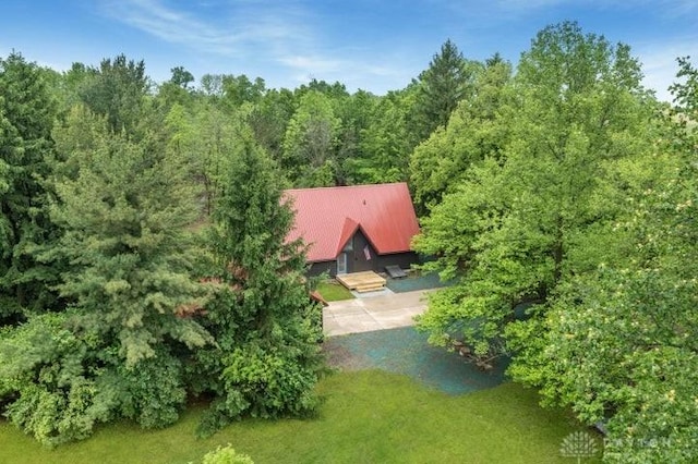 5565 Short Rd, New Carlisle, OH 45344 - aerial view of property and surrounding area with a heavily wooded area