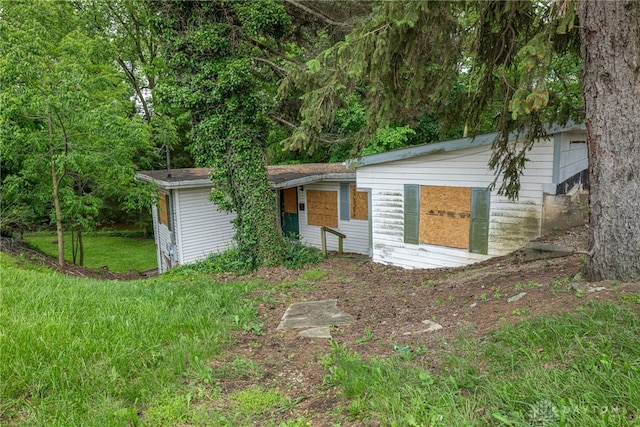 222 S Pike St, New Carlisle, OH 45344 - view of front of house featuring a front yard