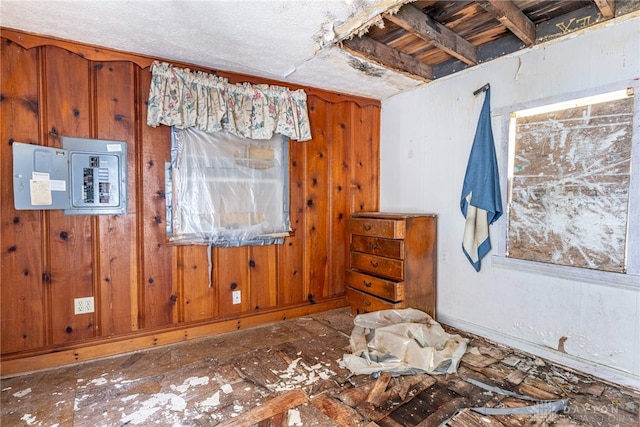 222 S Pike St, New Carlisle, OH 45344 - unfurnished room with electric panel and wood walls