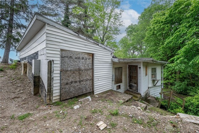 222 S Pike St, New Carlisle, OH 45344 - view of outbuilding featuring a garage