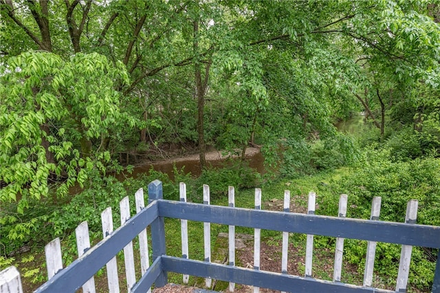 222 S Pike St, New Carlisle, OH 45344 - view of yard featuring a wooded view