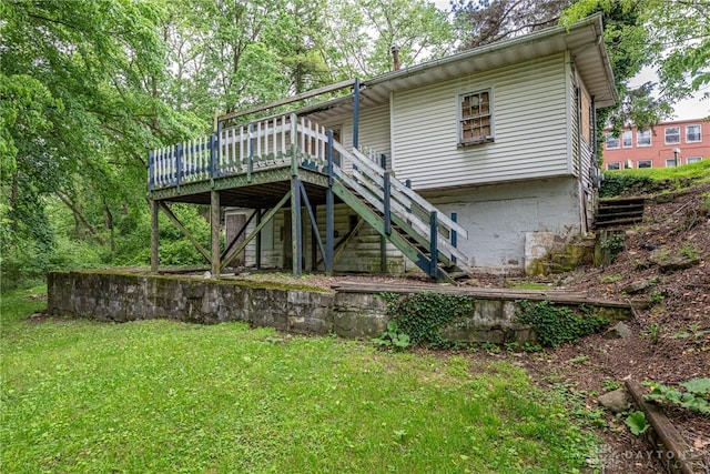 222 S Pike St, New Carlisle, OH 45344 - back of house with a wooden deck, stairs, and a yard