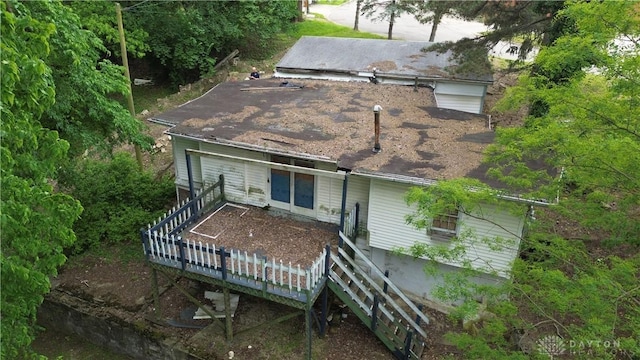 222 S Pike St, New Carlisle, OH 45344 - rear view of property featuring a wooden deck and stairs