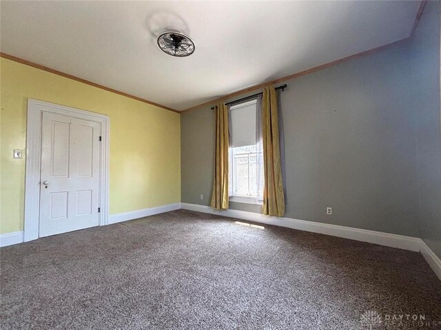 142 W Church St, Xenia, OH 45385 - carpeted empty room featuring ornamental molding and baseboards