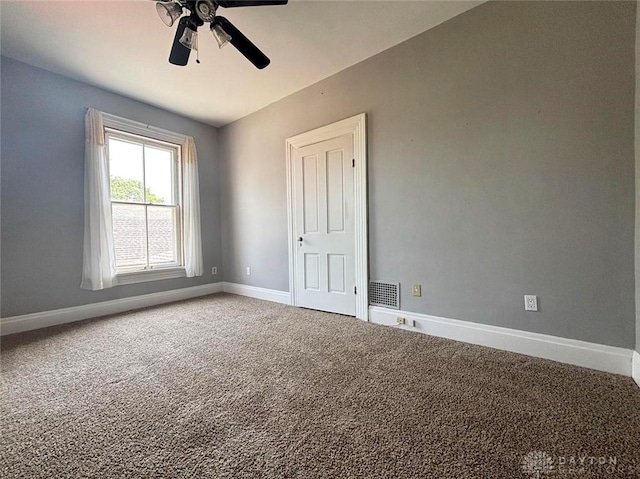 142 W Church St, Xenia, OH 45385 - unfurnished room featuring ceiling fan, carpet flooring, and baseboards