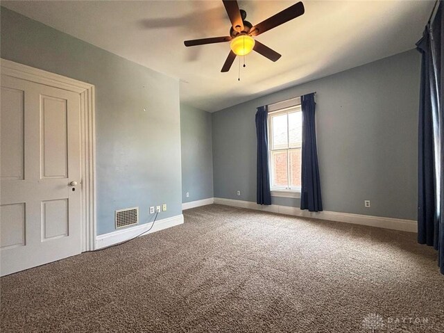142 W Church St, Xenia, OH 45385 - unfurnished room featuring carpet, ceiling fan, and baseboards