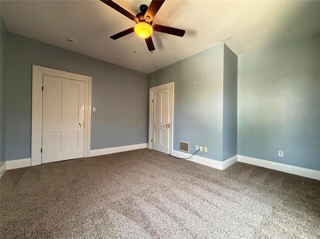 142 W Church St, Xenia, OH 45385 - unfurnished room featuring ceiling fan, baseboards, and carpet floors