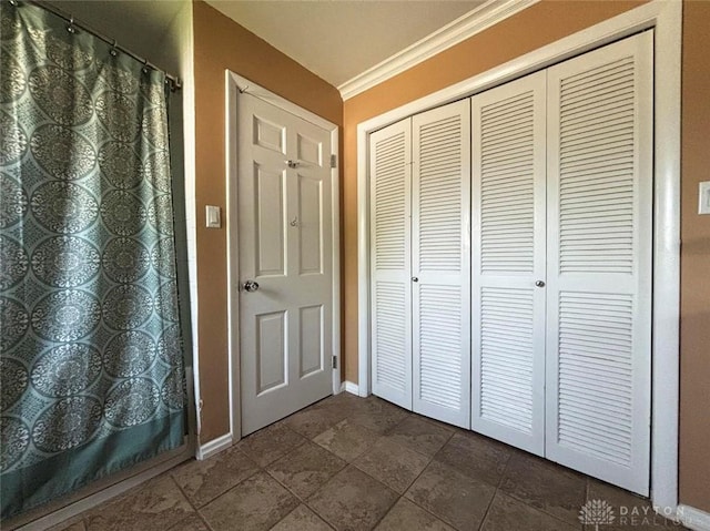 142 W Church St, Xenia, OH 45385 - foyer entrance featuring baseboards and crown molding