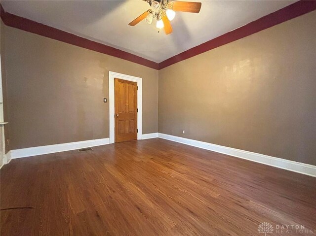 142 W Church St, Xenia, OH 45385 - spare room featuring ceiling fan, wood finished floors, and baseboards
