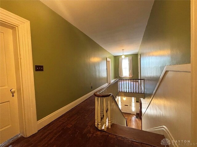142 W Church St, Xenia, OH 45385 - staircase with wood-type flooring and baseboards
