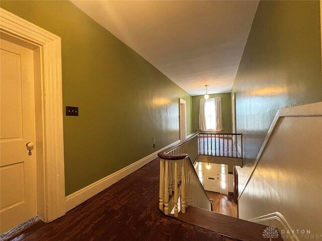 142 W Church St, Xenia, OH 45385 - stairway with wood-type flooring and baseboards