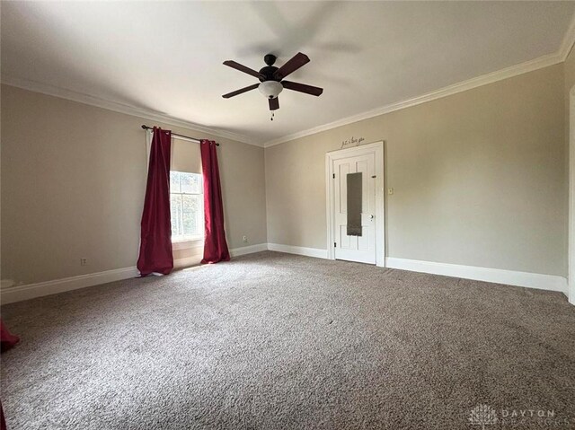 142 W Church St, Xenia, OH 45385 - carpeted spare room featuring a ceiling fan, ornamental molding, and baseboards