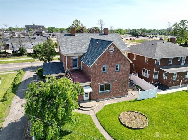 142 W Church St, Xenia, OH 45385 - back of house with brick siding and a chimney