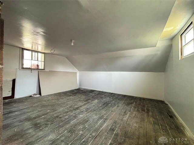 142 W Church St, Xenia, OH 45385 - bonus room with hardwood / wood-style flooring, vaulted ceiling, and baseboards