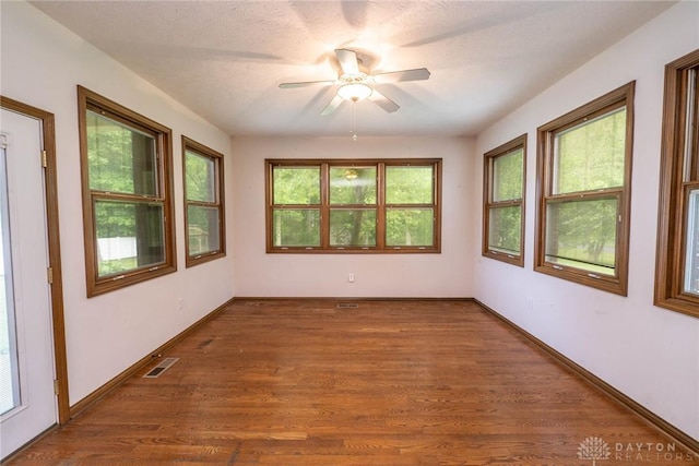 9062 Adam Ln, Waynesville, OH 45068 - unfurnished room featuring ceiling fan, wood finished floors, and baseboards