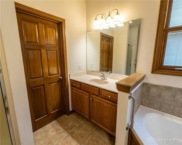 9062 Adam Ln, Waynesville, OH 45068 - full bath with vanity, a bath, and tile patterned flooring