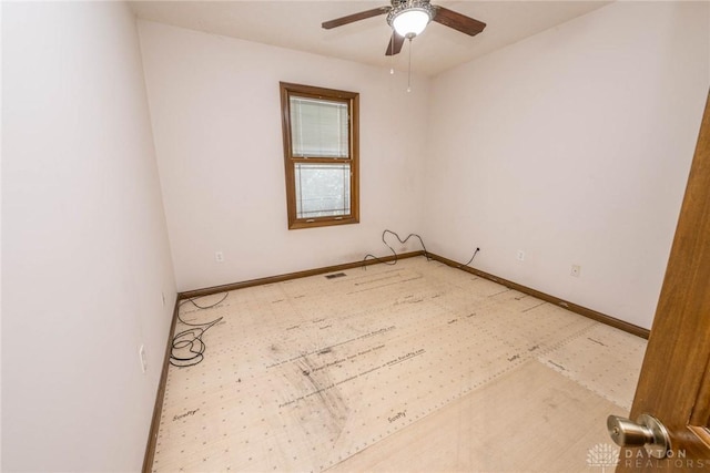 9062 Adam Ln, Waynesville, OH 45068 - spare room with ceiling fan and baseboards