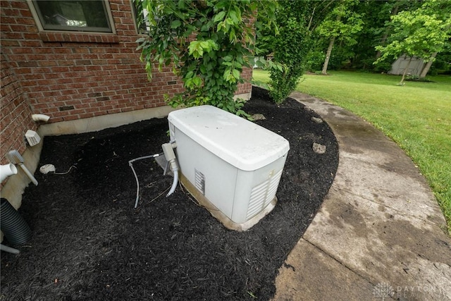 9062 Adam Ln, Waynesville, OH 45068 - exterior view of brick siding and a power unit