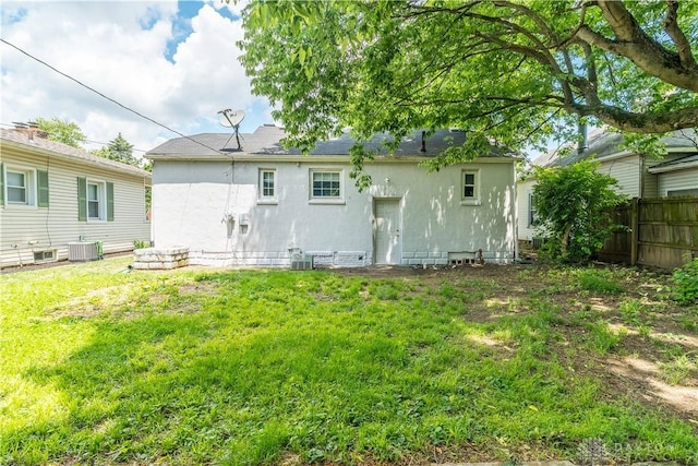 3108 Ohio Ave, Middletown, OH 45042 - rear view of house featuring cooling unit and stucco siding