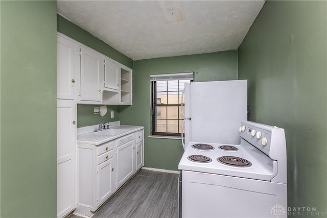 515 Aberdeen Ave, Dayton, OH 45419 - kitchen with white appliances, white cabinetry, light countertops, and dark wood-style flooring