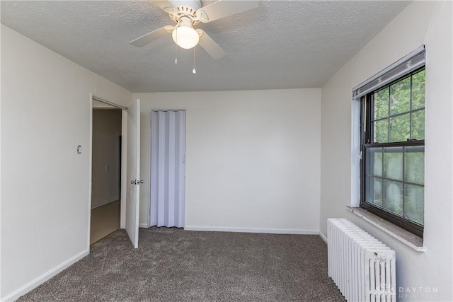 515 Aberdeen Ave, Dayton, OH 45419 - carpeted spare room with radiator heating unit, a textured ceiling, and ceiling fan