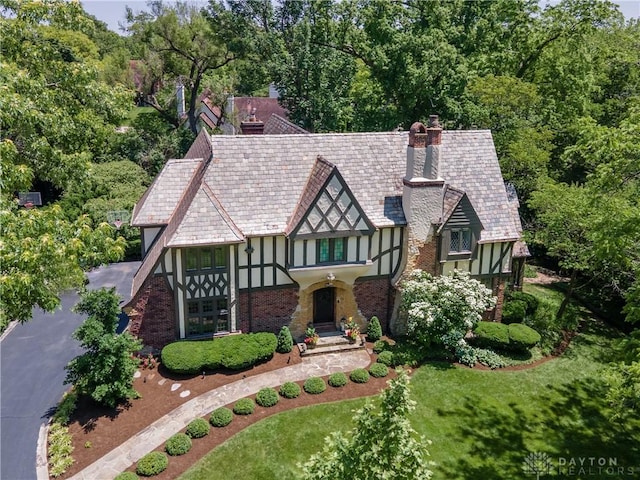 1500 Ridgeway Rd, Oakwood, OH 45419 - view of front of home with stucco siding and a chimney